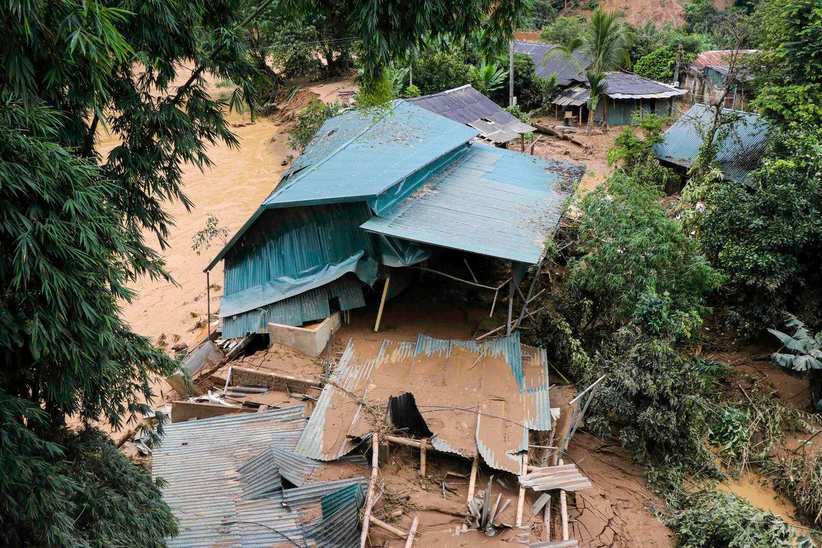 This photo taken by the Vietnam News Agency (VNA) on August 1, 2025 shows a collapsed house due to flooding in northern Vietnam’s Dien Bien province. AFP PHOTO / Vietnam News Agency