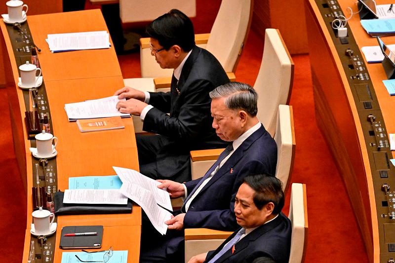 (L-R) Vietnam’s President Luong Cuong, Vietnam’s General Secretary of the Communist Party To Lam and Vietnam’s Prime Minister Pham Minh Chinh attend the National Assembly’s summer session opening in Hanoi on May 5, 2025. - Nhac NGUYEN / AFP