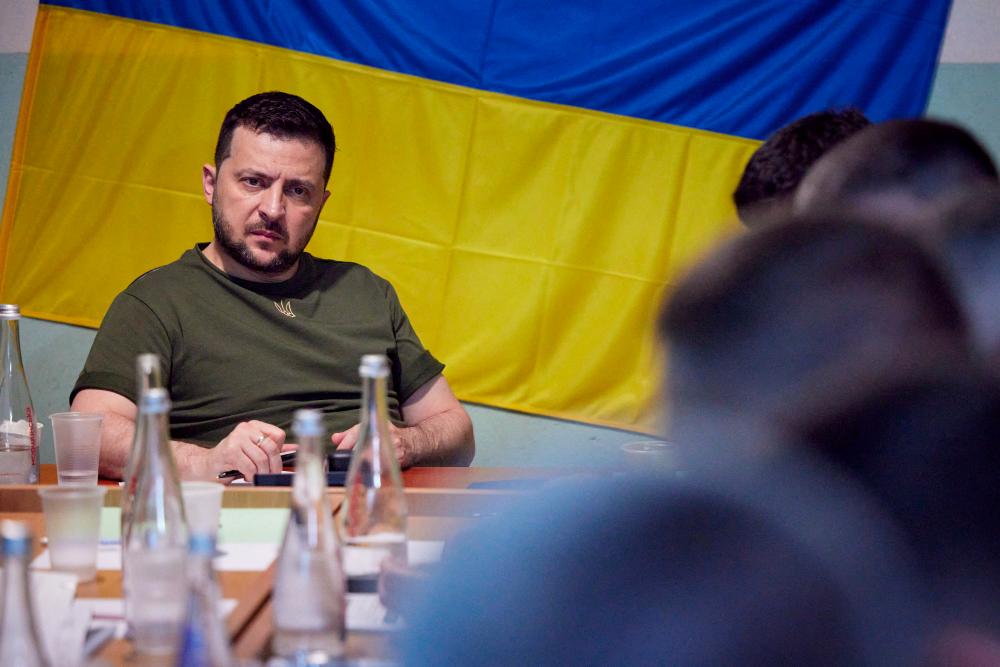 File photo: Ukraine's President Volodymyr Zelenskiy attends a meeting with local authorities during a visit to the southern city of Mykolaiv, as Russia's attack on Ukraine continues, in Ukraine June 18, 2022. Ukrainian Presidential Press Service/Handout via REUTERSpix