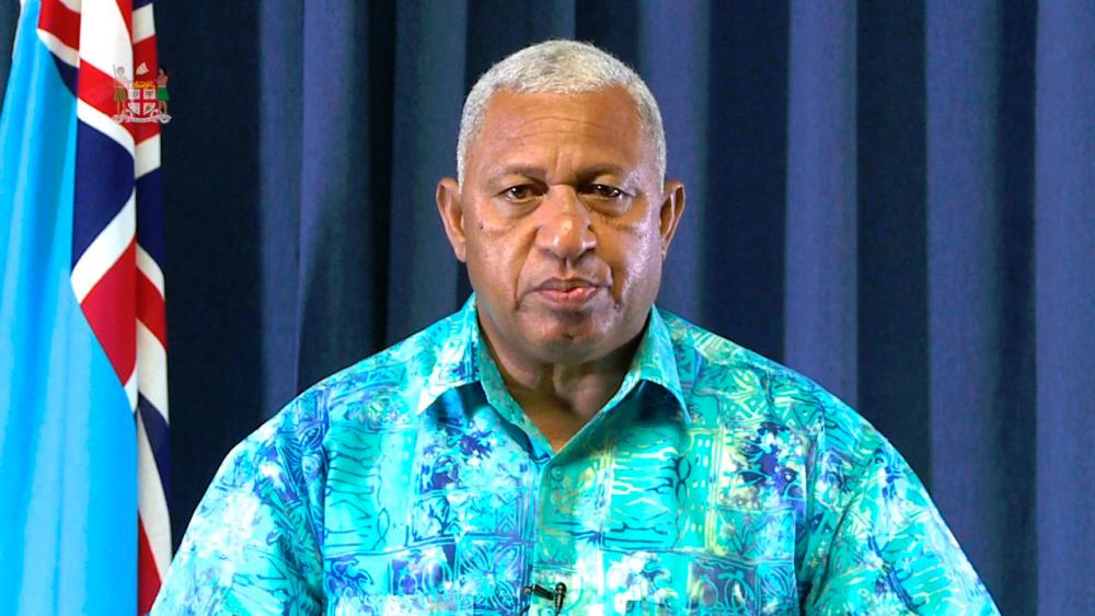 Pictures shoes Fijian Prime Minister, Voreqe Vainimarama.