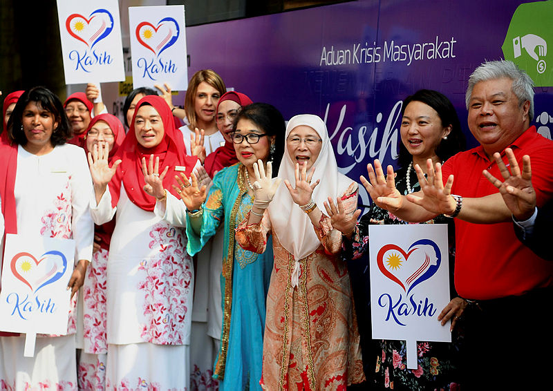 Women, Family And Community Development Minister, Datuk Seri Dr Wan Azizah Wan Ismail (3rd R) and her deputy Hannah Yeoh (2nd R), post for a photo with activists, delegates and guests during the launch of an awareness campaign against abandoning newborns, #SaveALife, on Aug 3, 2019. — Bernama