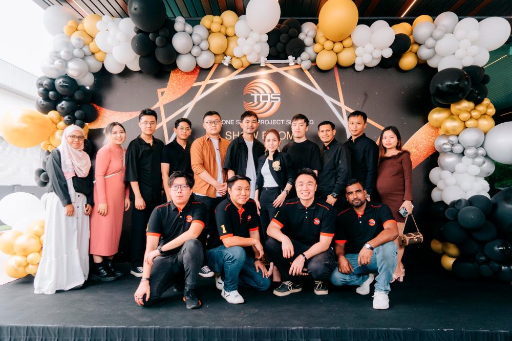 Tos founder Joey Tan (fifth from top right) at the new TOS showroom launch in Semenyih, Selangor.
