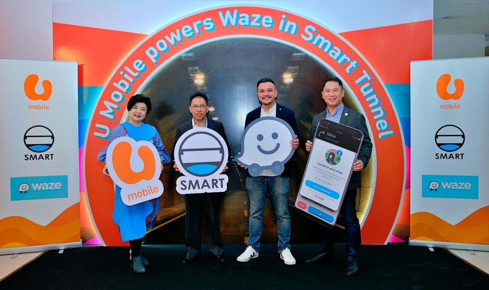 From left: Lee, Mohd Noor, Waze Malaysia country lead Kelvin Sim and U Mobile chief technology officer Woon Ooi Yuen in a photo session just before the movement control order came into effect in March.