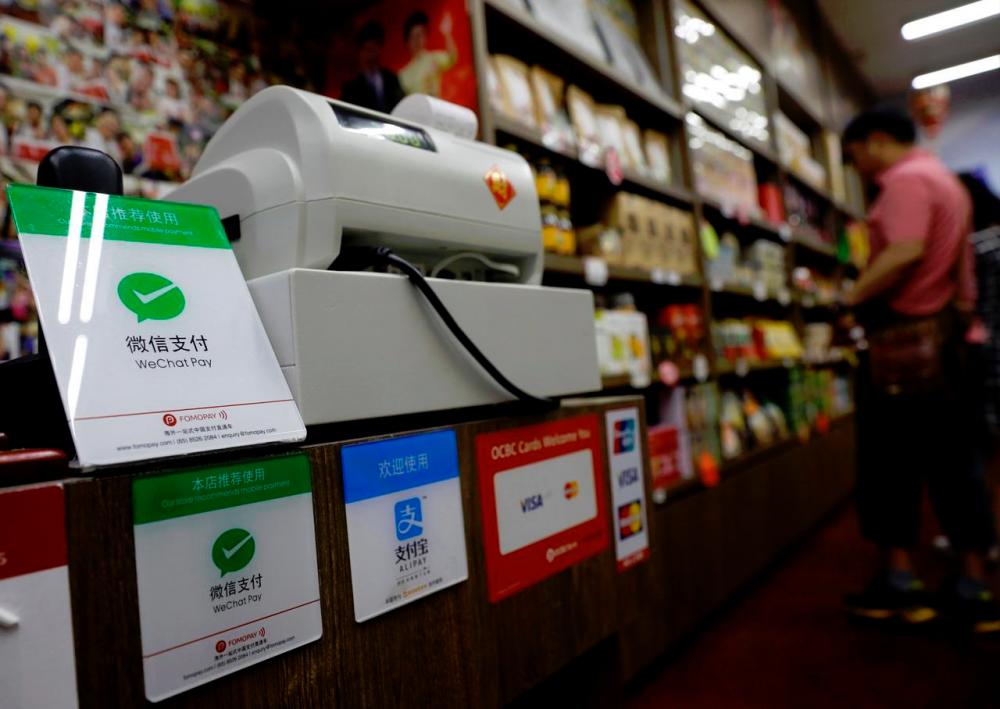 China mobile payment giants Alipay, WeChat Pay open to international cards