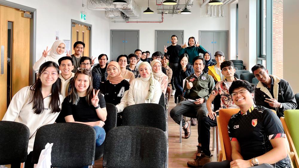 A group of Malaysians currently abroad at a recent gathering to discuss the postal vote issue.