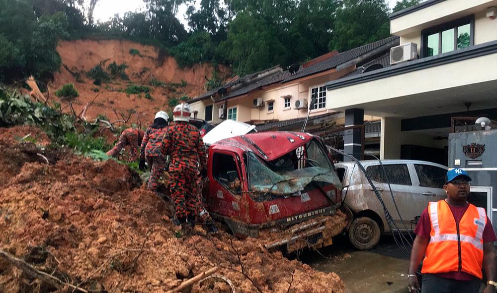 There are a few factors that cause landslides in Malaysia such as rainfall, poor slope maintenance, improper drainage system, loading change on soil, water level change and slope geometry. Pix courtesy of Selangor Fire Department