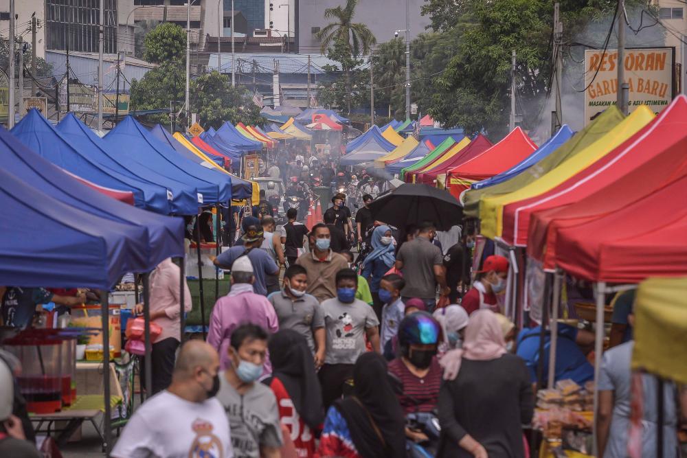 The government will soon announce more refined standard operating procedures for Ramadan bazaar traders. – Adib Rawi Yahya/theSun