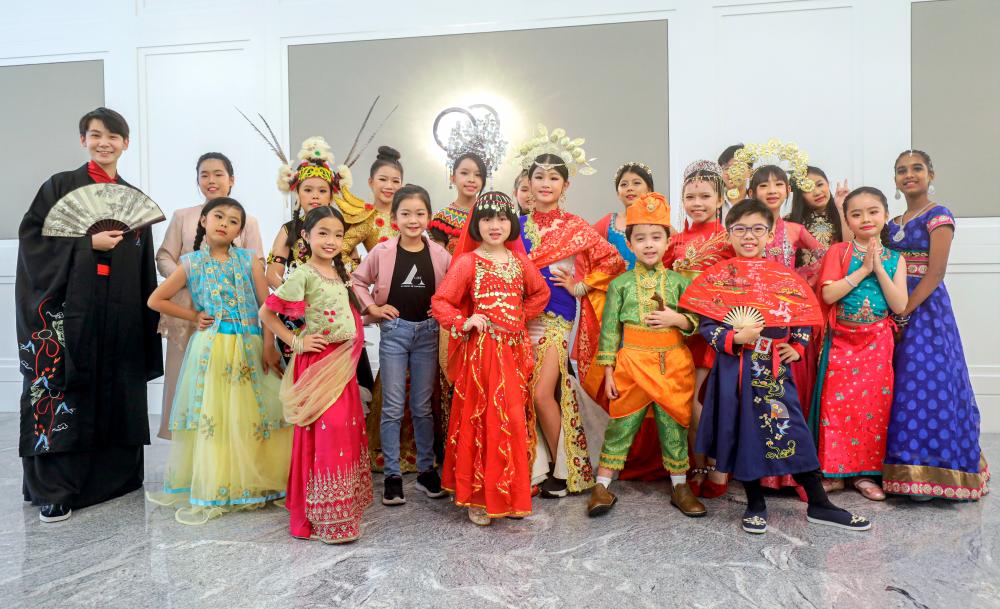 Alist Academy Malaysia members pose for a picture after performing at the Selangor King George V Silver Jubilee Fund luncheon to celebrate the International Day of the Older Persons. – AMIRUL SYAFIQ/THESUN