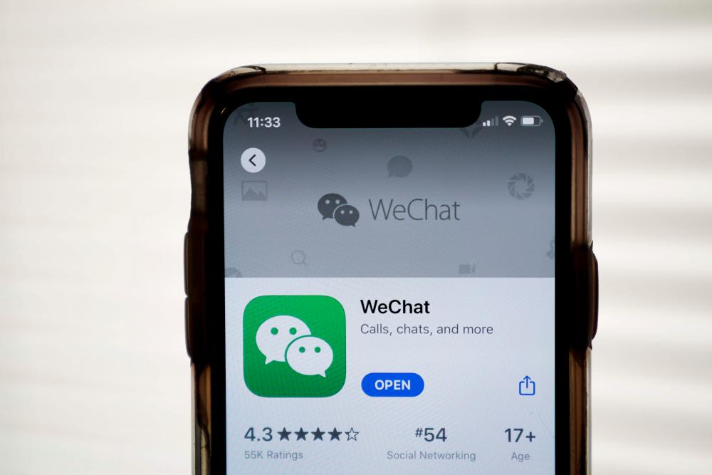 The WeChat app is displayed in the App Store on an Apple iPhone. – AFPPIX