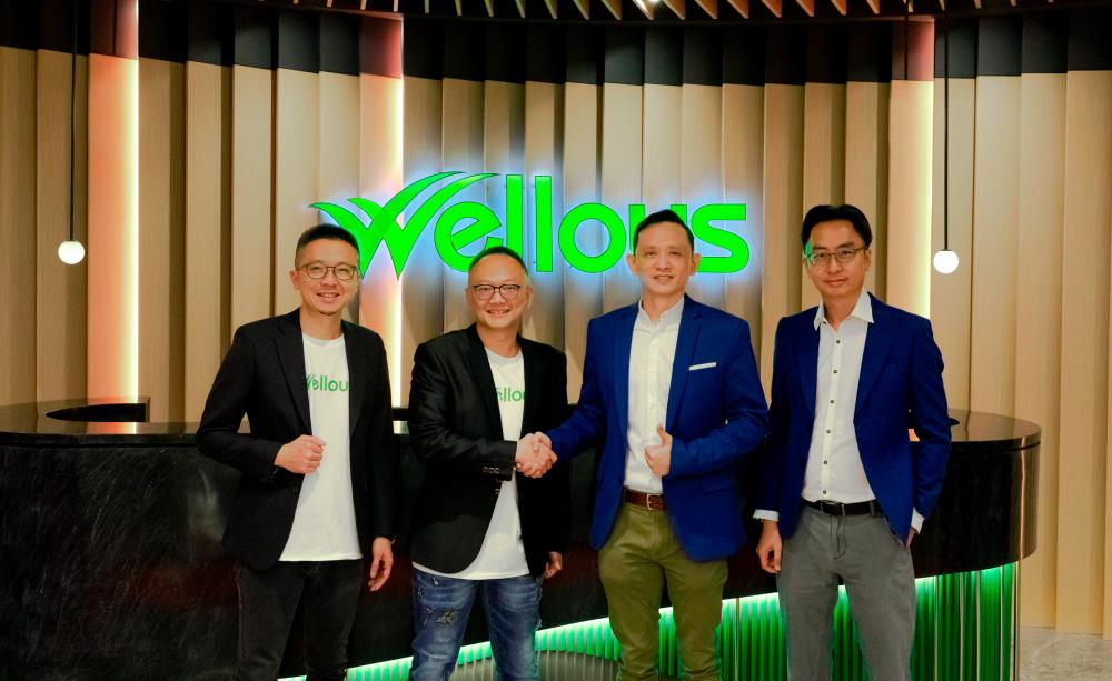 From left: Wellous’ co-founders Henry Chin, Andy Tan, Kairous CEO Joseph Lee and Kairous Capital’s partner See Toh Kean Yaw announcing their merger agreement.