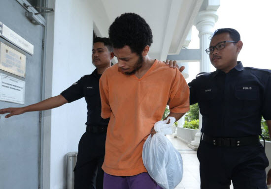 Libyan men charged in Sepang Magistrate’s Court, on Oct 29, 2018 charged with killing Telekom Malaysia Berhad (TM) staff at Shaftsbury Square, Cyberjaya in the middle of this month. — Sunpix