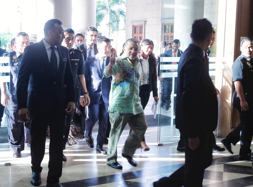 Former Felda chairman, Tan Sri Mohd Isa Abdul Samad arrives at Kuala Lumpur Complex Court, on Dec 14, 2018. — Sunpix