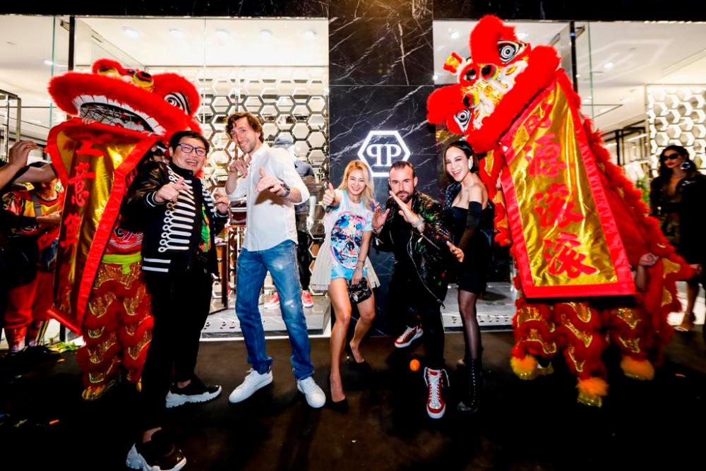 From left: PRG Holdings Bhd group executive vice chairman Datuk Lua Choon Hann, Philipp Plein International AG CEO Ennio Fontana, Korean celebrity Kim Hyo-yeon, German designer Philipp Plein and Singaporean celebrity Fiona Xie at the grand opening of the flagship outlet located at The Shoppes at Marina Bay Sands, Singapore.
