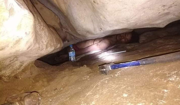 Man rescued after being trapped in cave for four days
