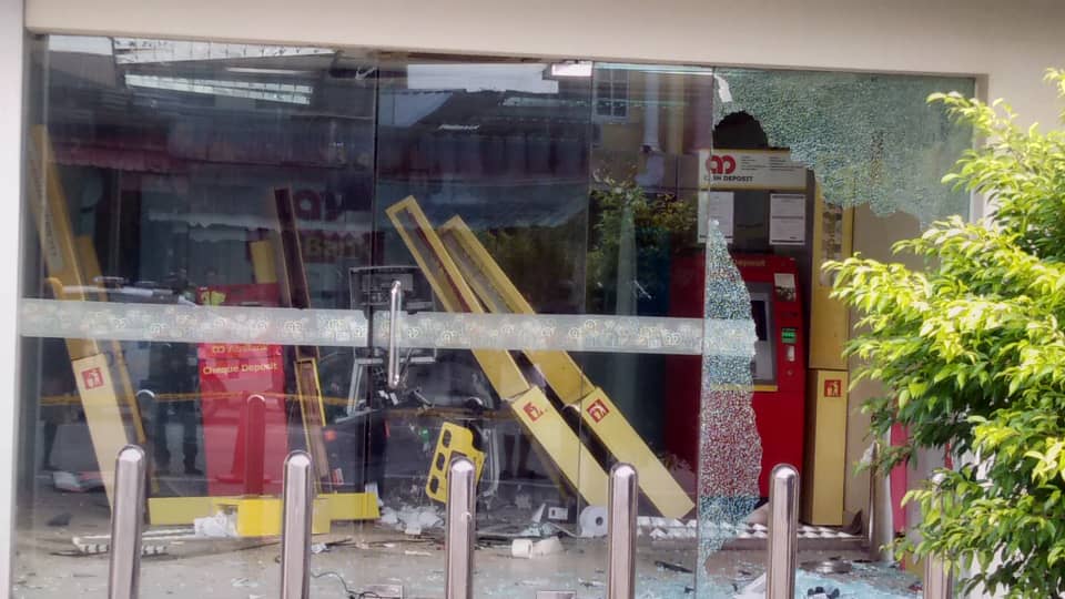 The badly damaged ATM room of a bank in Muallim, Perak on Aug 12, 2019.