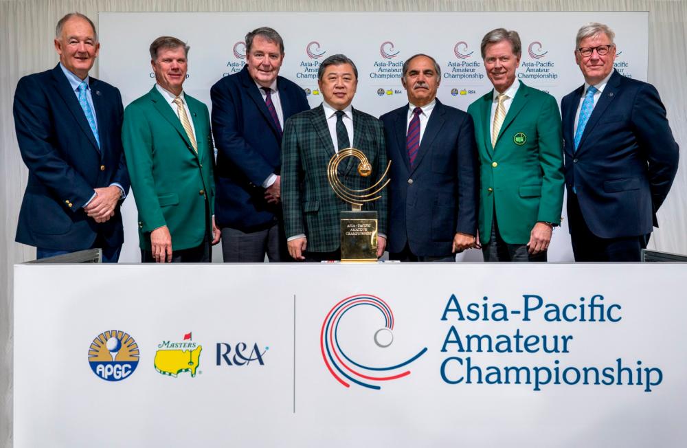 (From left) Niall Farquharson, Chairman of The R&amp;A; Pat Battle; Phillip Hassal; President Shun Han of Taiheiyo Club; Taimur Hassan Amin, Chairman of the Asia-Pacific Golf Confederation; Chairman of Augusta National Golf Club and the Masters Tournament Fred Ridley; and Martin Slumbers, CEO of The R&amp;A, pose for a group photo alongside the Asia-Pacific Amateur Championship trophy following the announcement of the 2024 venue. - Photo by AAC