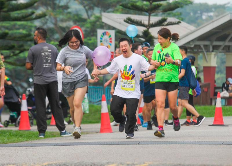 The special needs children each had a volunteer pacer so they could complete in time