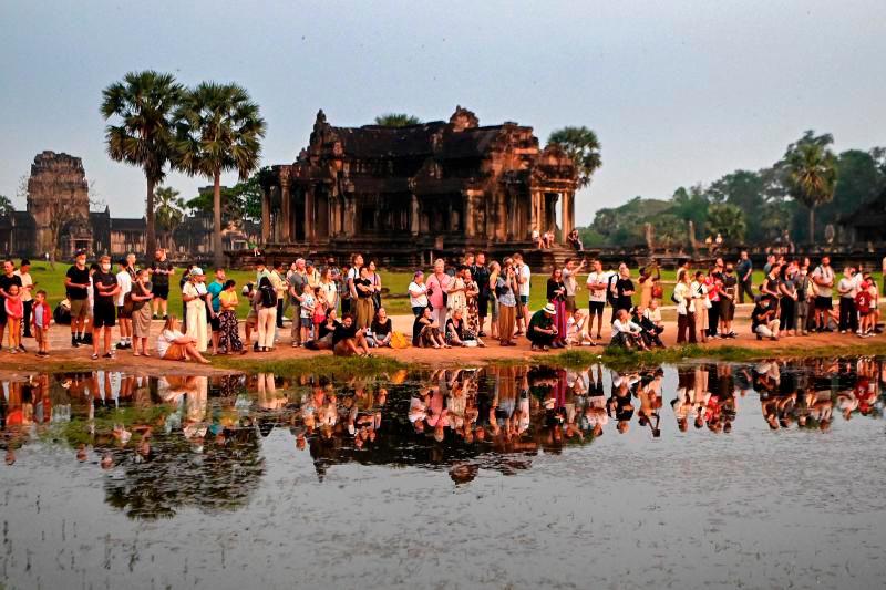 $!The Angkor Wat temple complex is still the number one tourist attraction in Cambodia. –AFPPIC
