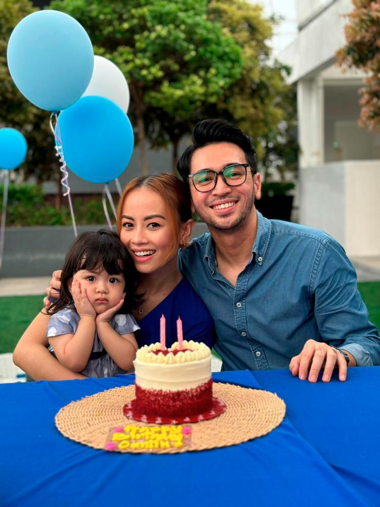 $!Akhmal with his wife and kid.