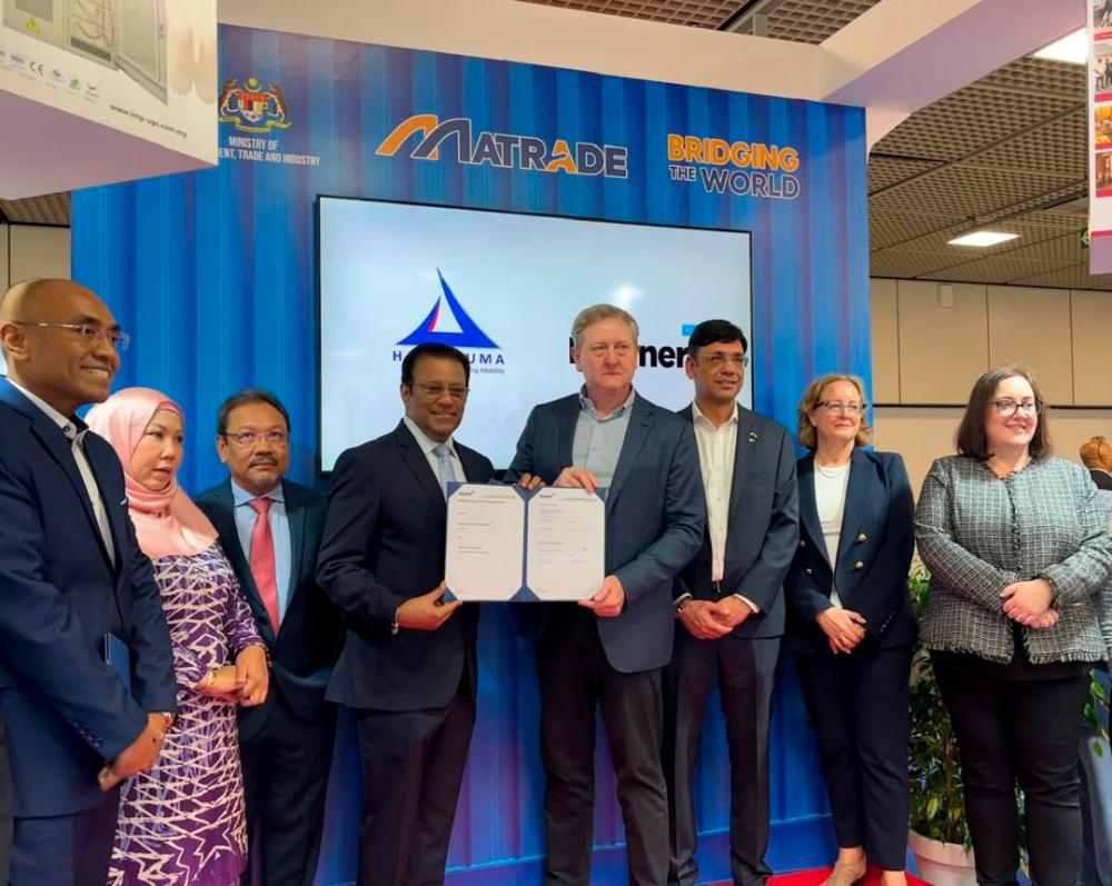 Signing the landmark rail deals. (From left): Hartasuma Sdn Bhd (HSB) Group chief business development officer Mohamed Rizal Mohamed Sapari, Malaysian Ambassador to the Federal Republic of Germany Datin Paduka Dr Adina Kamarudin, Malaysia Rail Industry Corporation president Datuk Dr Mohd Yusoff Sulaiman, HSB executive director Tan Sri Ravindran Menon, Downer group chief operating officer of rail &amp; transit systems Stephen Kakavas, executive general manager emerging markets &amp; growth Usman Pervaiz, National Rail Manufacturing Advocate and Rail Industry Innovation Council chair Jacqui Walters and Australasian Railway Association CEO Caroline Wilkie.