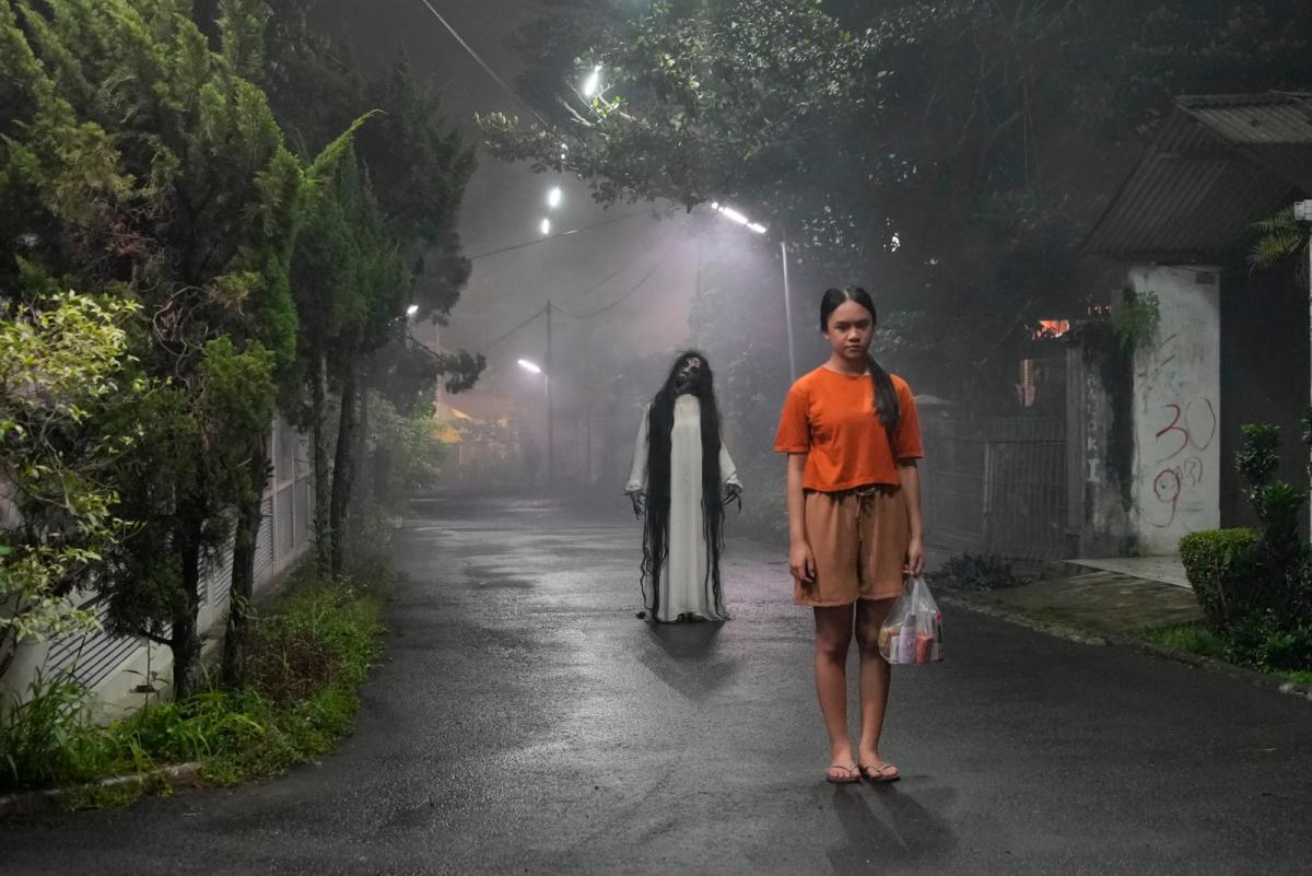 (Front) Vita (Neona) begins to sense the haunting presence creeping into her life. - ALL PICS FROM PR