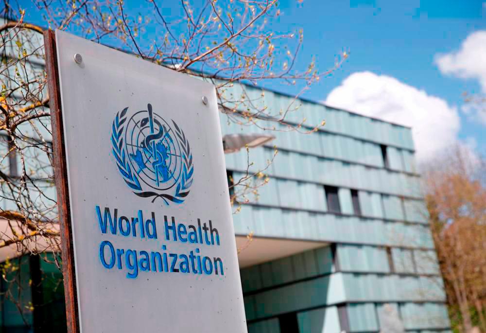 A logo is pictured outside a building of the World Health Organization (WHO) during an executive board meeting in Geneva, Switzerland, April 6, 2021. -REUTERSPix