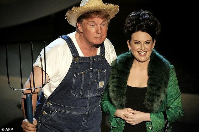 Green Acres: Donald Trump and Actress Megan Mullally perform the theme song of the old cornpone sitcom for the 2005 Emmy Awards ceremony. — AFP