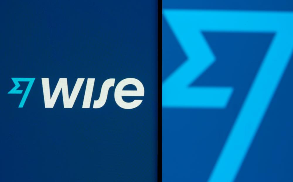 Wise’s logo is seen on a smartphone in front of a displayed detail of the same logo in this illustration. – REUTERSPIX