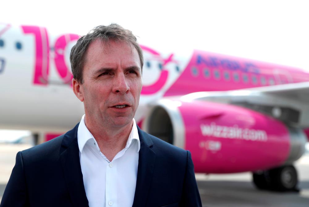 Varadi at Budapest Airport, Hungary. He bemoaned a lack of political coordination over travel restrictions and other measures to tackle the Covid-19 crisis – REUTERSPIX