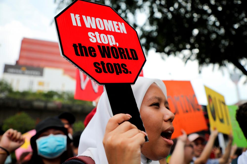 Women take part in a Women's March to mark International Women's Day in Kuala Lumpur, Malaysia, March 8, 2020. - Reuters