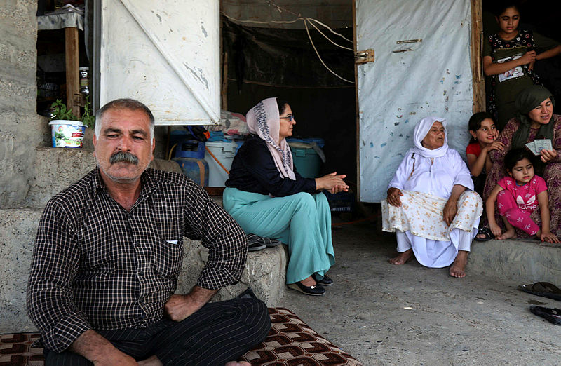Iraq’s Yazidi Bashar Hamad, 51, sits at the Khonke camp for displaced persons in northwestern Iraq on June 24, 2019 as he speaks about his search for his younger brother Nawaf since the Islamic State group overran their villages in the Yazidi stronghold of Sinjar in 2014. — AFP