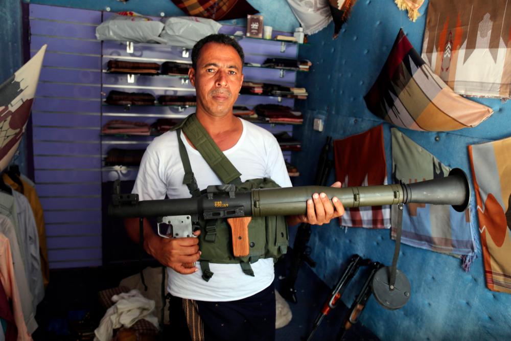 A man displays a rocket launcher at a shop in Yemen’s third city of Taez, on July 13, 2019. — AFP