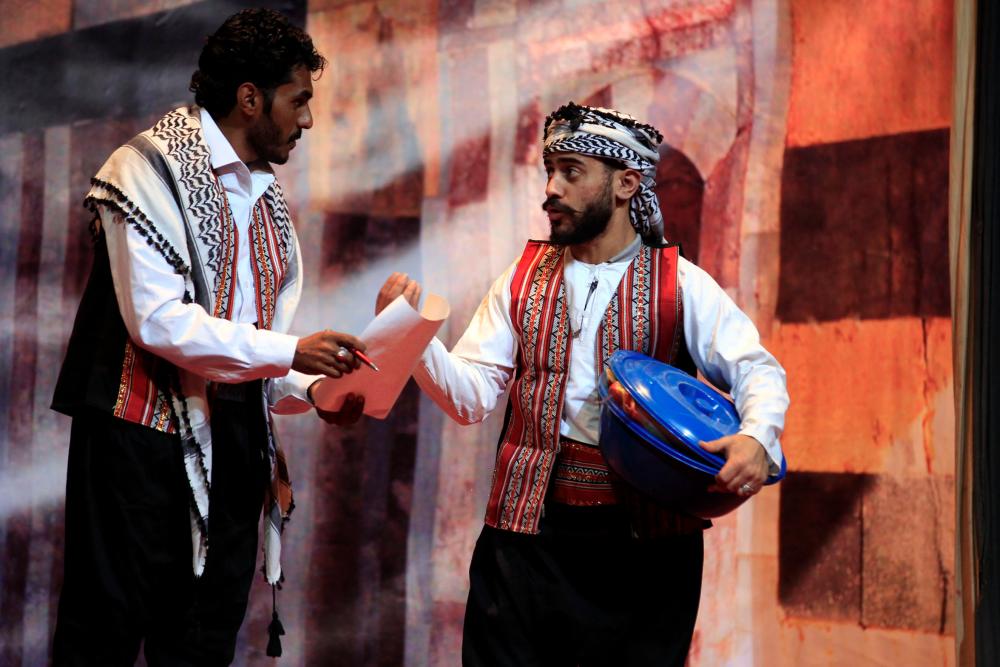Yemeni actors rehearse on the eve of the premiere of a play entitled ‘Yemeni Film’, a comedic production that touches on the current struggles of local artists, in the capital Sanaa, on December 23, 2020. AFP / MOHAMMED HUWAIS