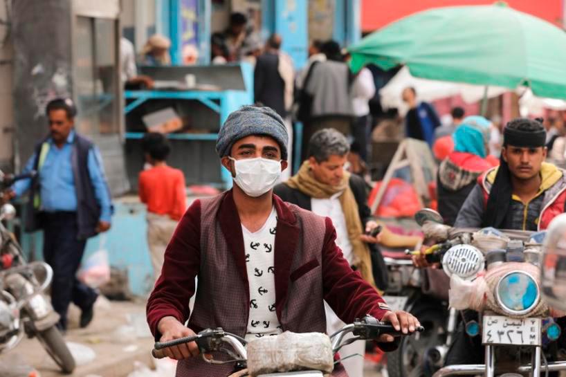 A man wears a protective face mask as he rides a motorcycle amid fears of the spread of the coronavirus disease (Covid-19) in Sanaa, Yemen March 16, 2020. Picture taken March 16, 2020. — Reuters