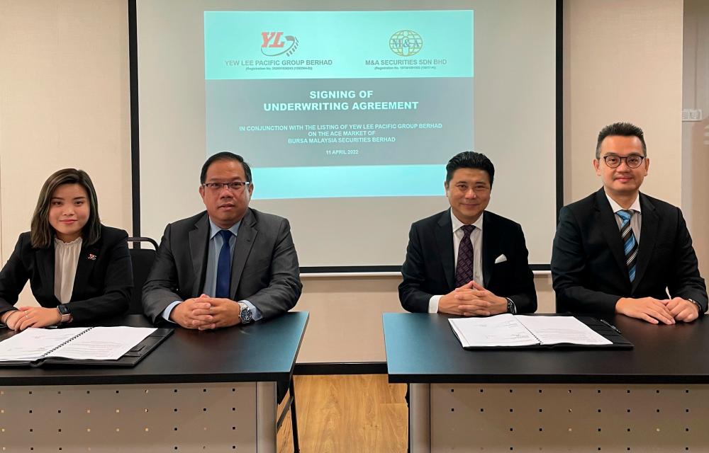 (From left) Yew Lee chief operating officer Amber Ang, Ang, Tan and M&amp;A Securities deputy head of corporate finance Danny Wong at the signing of underwriting agreement.