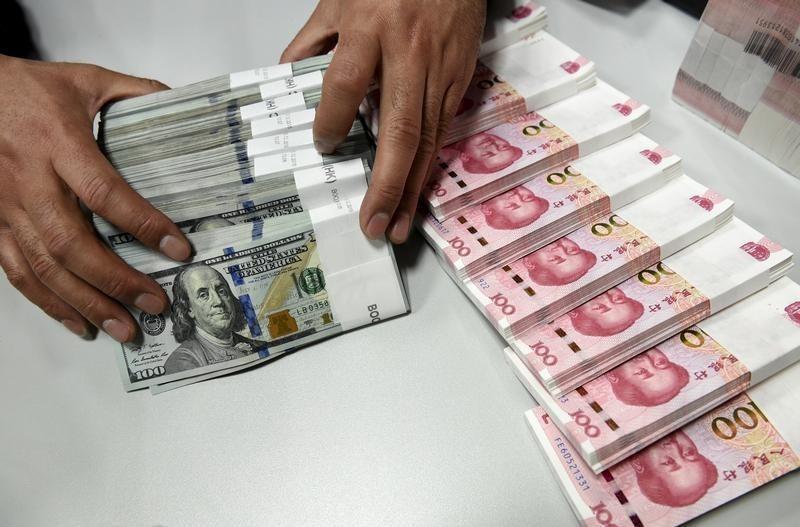Yuan eases off 1-mth high, focus back on trade after upbeat GDP
