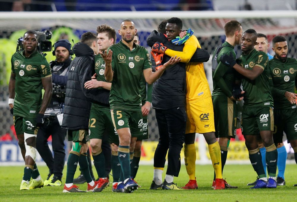 Stade de Reims’ Yunis Abdelhamid celebrates with team mates after the match against Olympique Lyonnais, January 11, 2019. ― Reuters