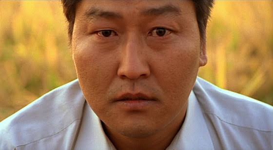 $!We know you are out there. Police detective Park Doo-man played by veteran actor Song Kang-ho seemingly stares into the audience during the final scene of Memories Of Murder