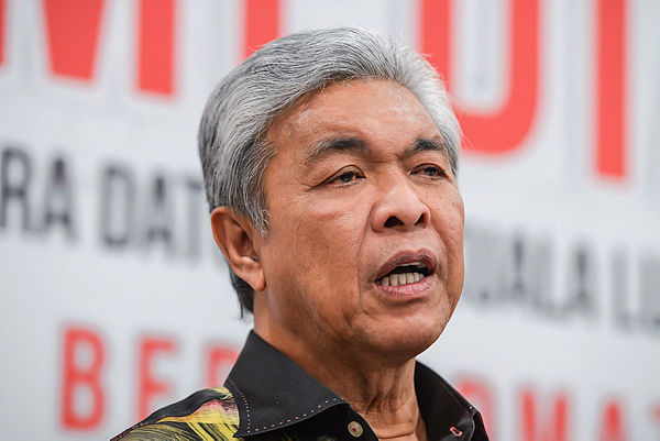 Zahid will only end his garden leave if he is needed by Umno