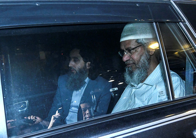 Zakir is transported out of Bukit Aman following questioning by police, on Aug 16, 2019. — Bernama