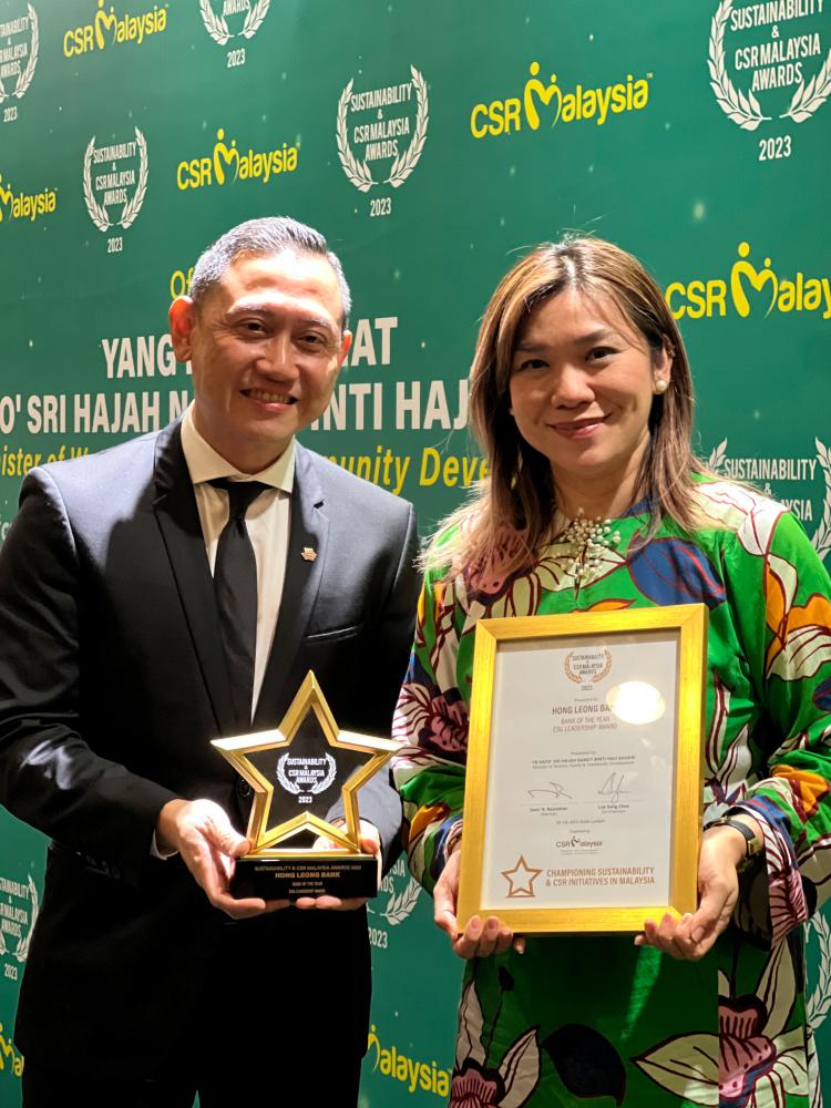 From left: Zalman and Hong Leong Bank corporate communications &amp; CSR general manager Vivian Tan, at the awards ceremony.