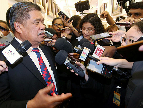 Filepix taken on Jul 15 shows Defence Minister Mohamad Sabu (left) at a press conference in parliament. — Sunpix by Zulkifli Ersal