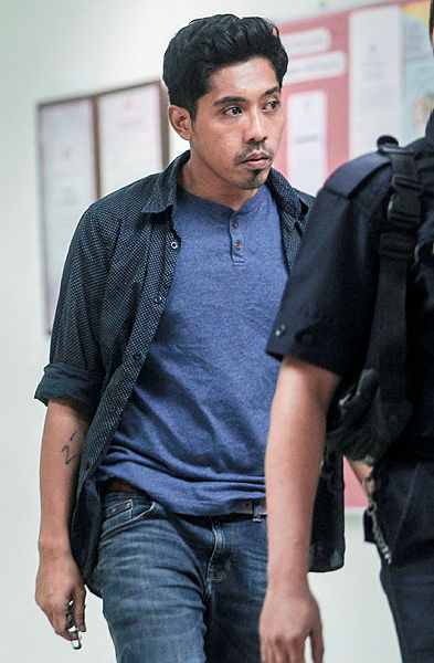 Marketing officer Muhammad Zikri Ibrahim, 29 (L) pleaded not guilty at the magistrate’s court here over a charge of making insulting statements in connection with 15-year-old Nora Anne Quoirin’s death last week. — BBXpress