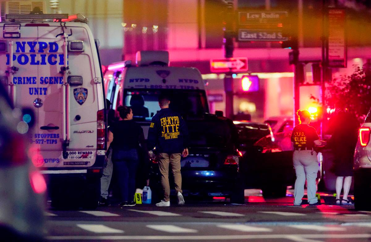 Gunman kills four in Manhattan skyscraper before suicide