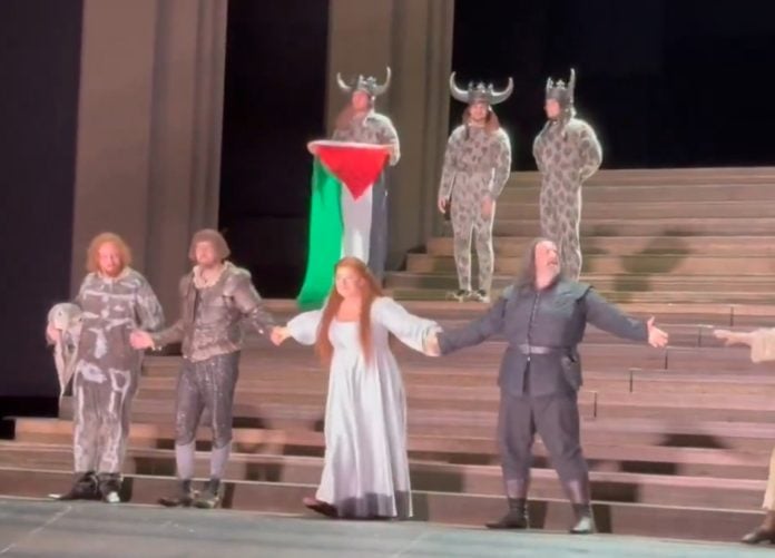 Scuffle at London opera as performer displays Palestinian flag