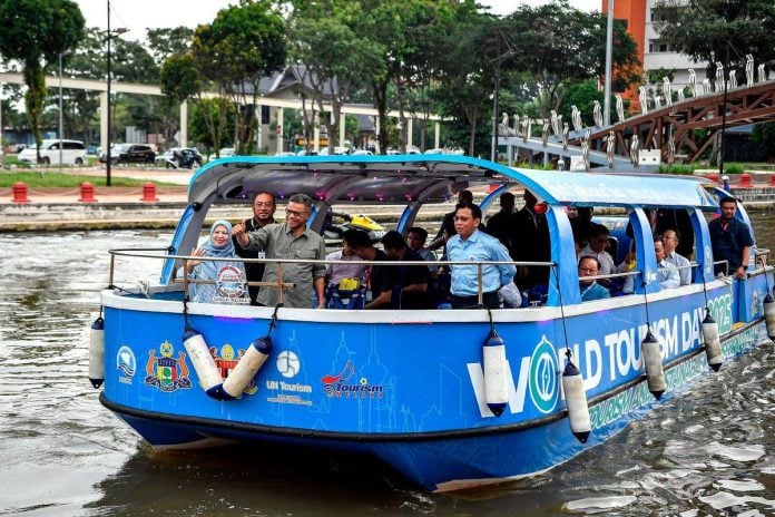ASEAN ministers enjoy Melaka River cruise during transnational crime meeting