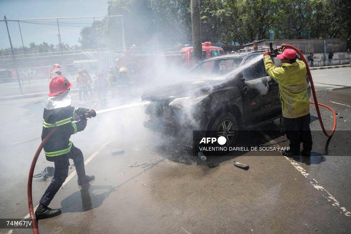 East Timor police fire tear gas at protesters opposing lawmakers’ car purchases East Timor police fire tear gas at protesters opposing lawmakers’ car purchases