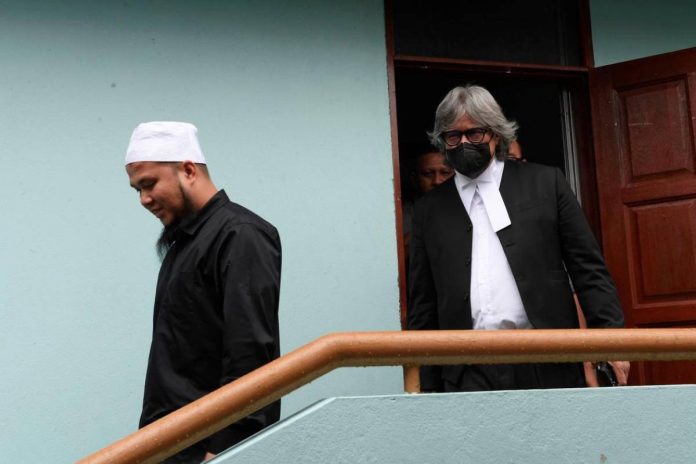 Ebit Lew case: Police analyst took seven days to examine 30,000 images