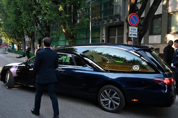 Giorgio Armani to be buried in private ceremony near Milan on Monday