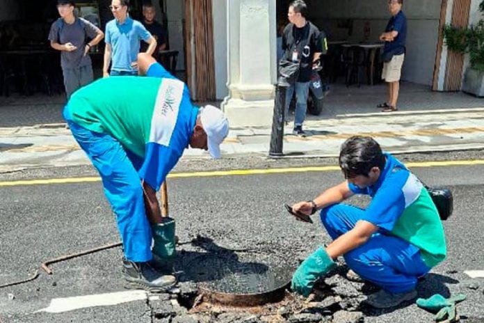 Jalan Burma sinkhole caused by IWK sewage pipe leak in Penang